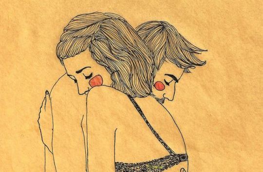 man and woman hugging