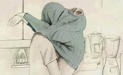 Couple Kissing Under Sweatshirt