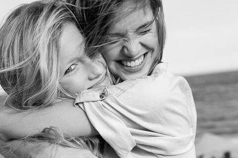 women hugging