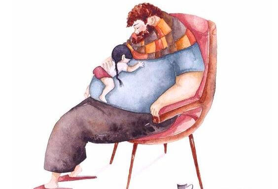 father holding daughter