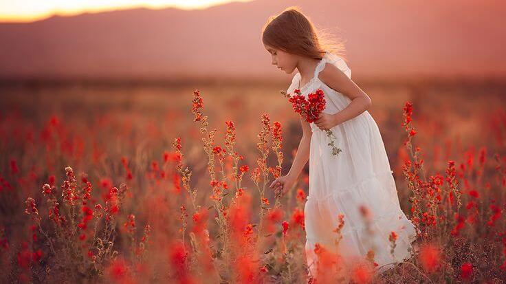 girl-in-a-field-of-red-flowers