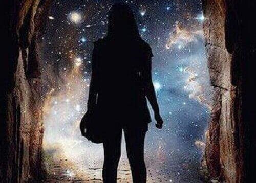 woman looking at starry sky