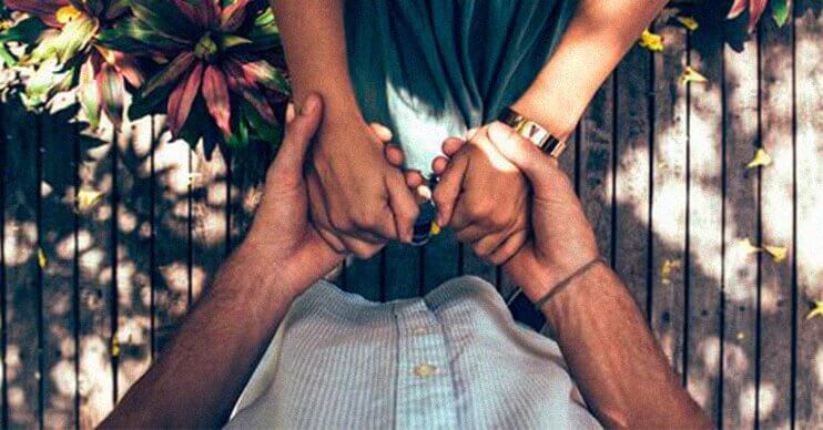 couple holding hands