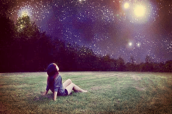 girl looking at starry sky