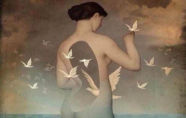 Doves Flying Through Woman