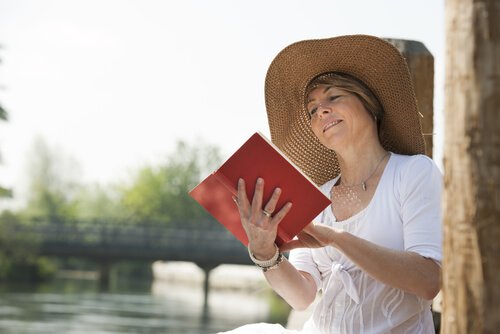 older woman reading books