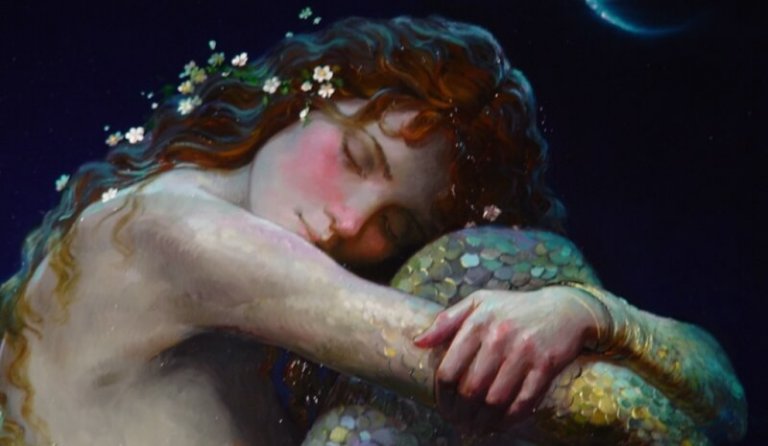 redhead hugging her knees