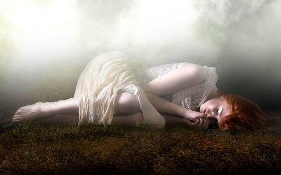 sad girl lying on the ground