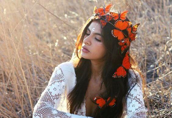 woman with butterfly crown