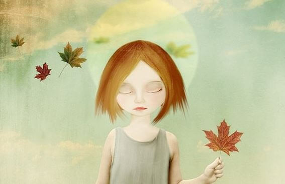 girl holding leaf