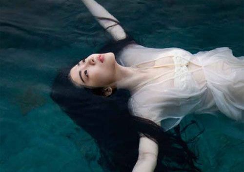 Girl Floating on Back