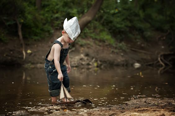 Kid with Toy Boat