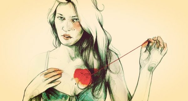 woman pulling out heart
