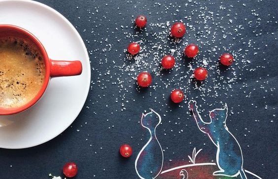 coffee cup and outline cats