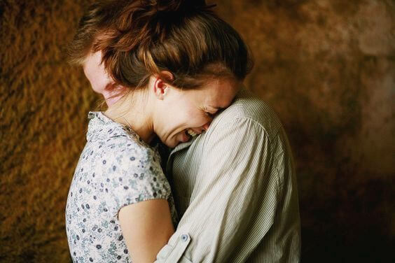 couple hugging and laughing