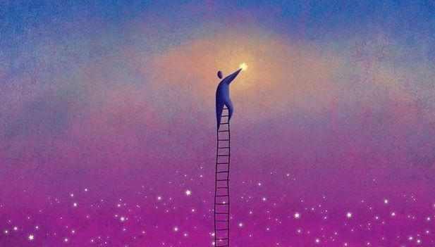 man on a ladder grabbing a star