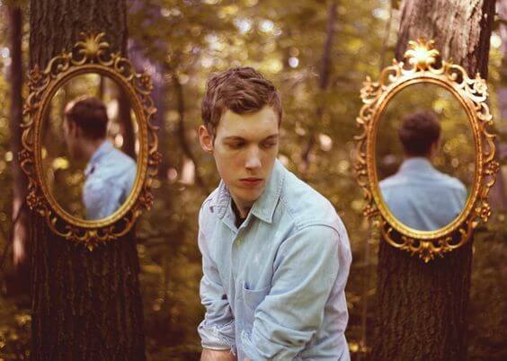 boy with two mirrors behind him