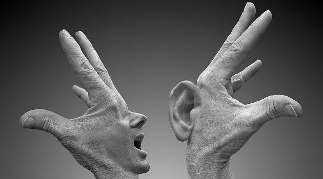 two hands one screaming one listening