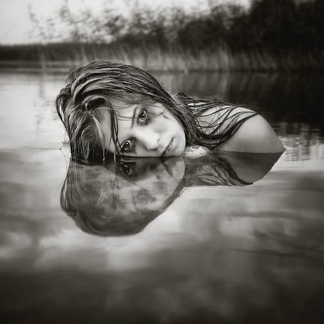 woman coming out of the water