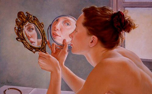 woman with two small mirrors