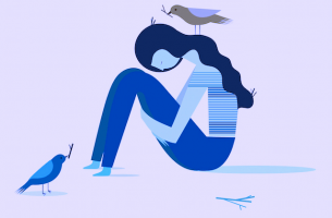 sad girl hugging knees