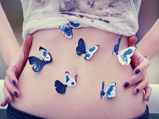 butterflies on girls abdomen