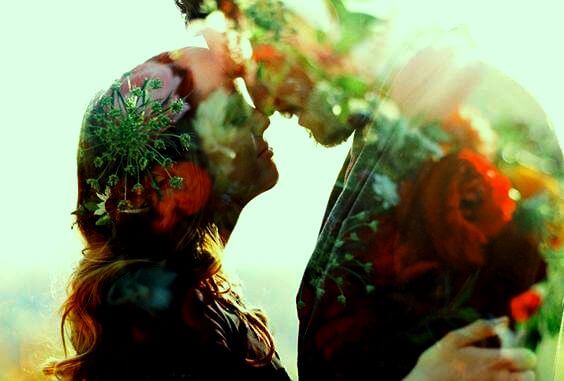 couple covered in flowers and weeds
