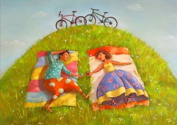 couple lying in the grass