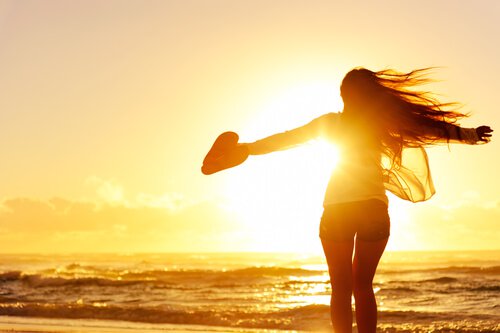 girl with heart at the beach