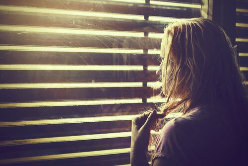 lady looking out window