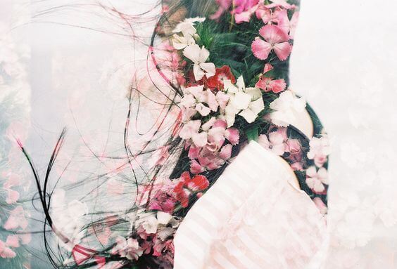 silhouette of girl in flowers