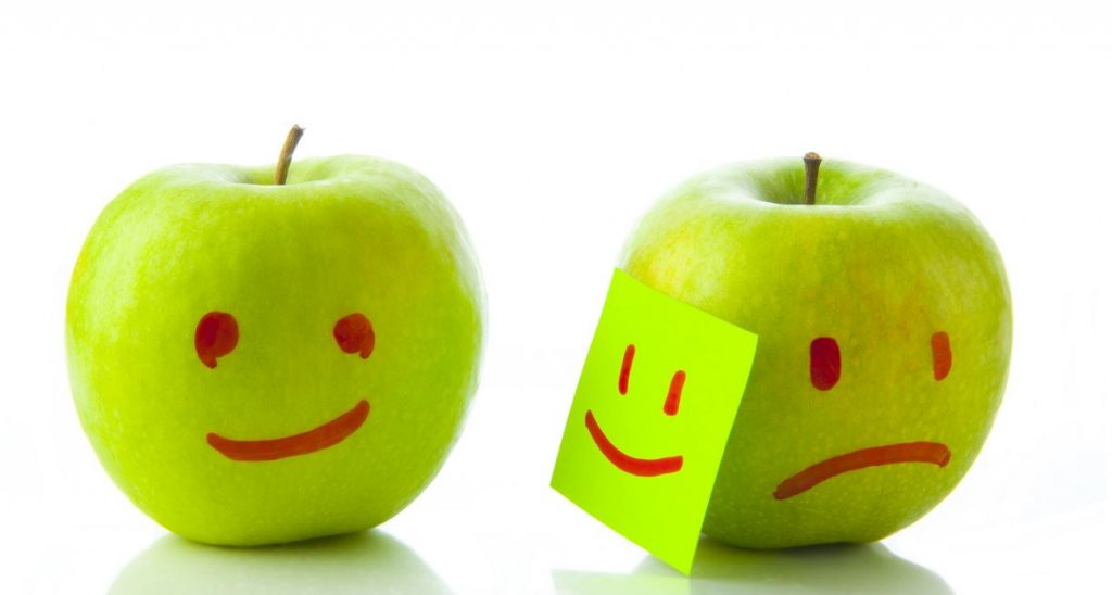 two apples one happy one sad