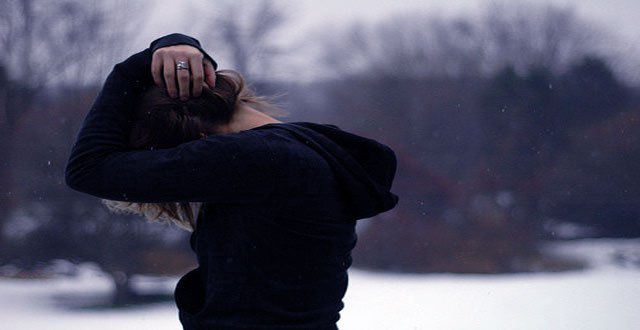 woman covering head