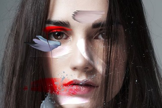 lady with paint strokes across face