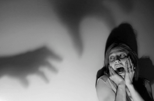 woman scared of shadows