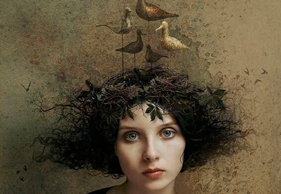 woman with bird nest on head