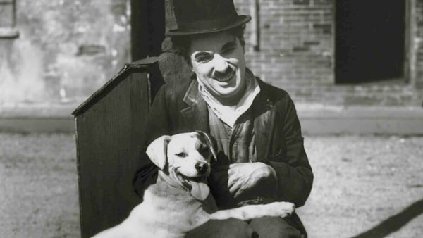Charlie Chaplin with a dog