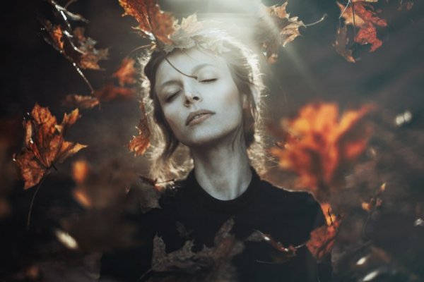 A woman in the woods.