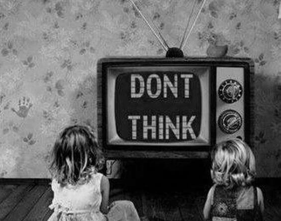 children in front of the television that says "DON'T THINK"