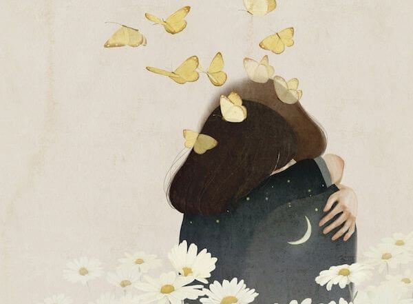 A couple hugging with butterflies flying out of them.