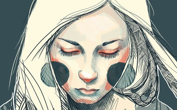 A girl looking down.