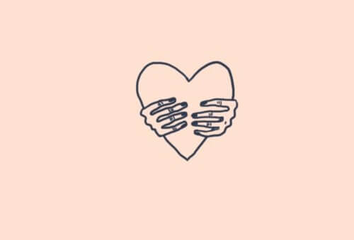 hands holding a heart