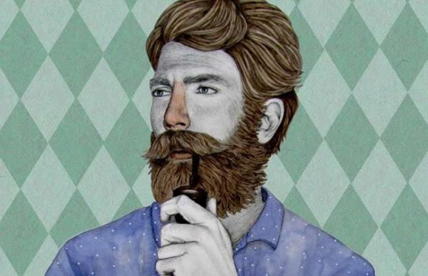 A man with a beard smoking a pipe.