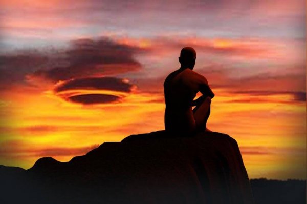 a man meditating at sunset, start your day with meditation