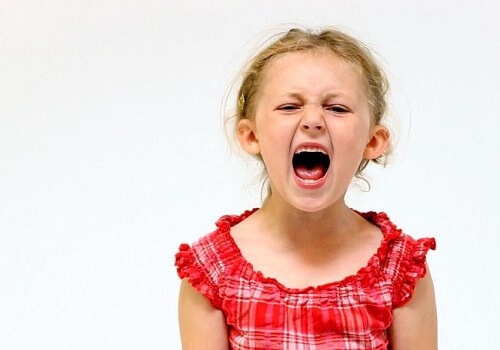 a child tyrant, a little girl screaming