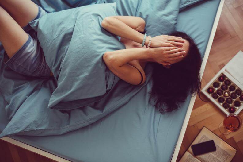 woman nighttime anxiety sleep