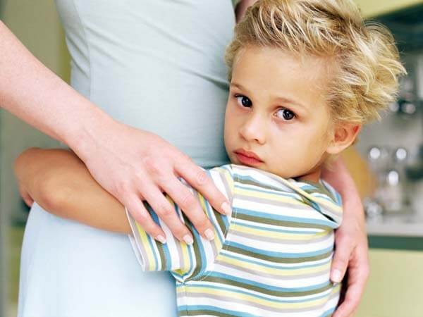 child hugging mother