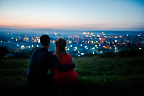 a couple watching the sunset