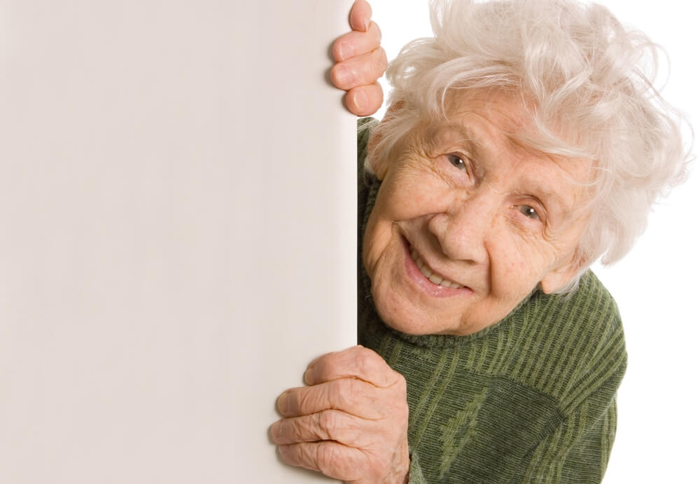 An older woman smiling.
