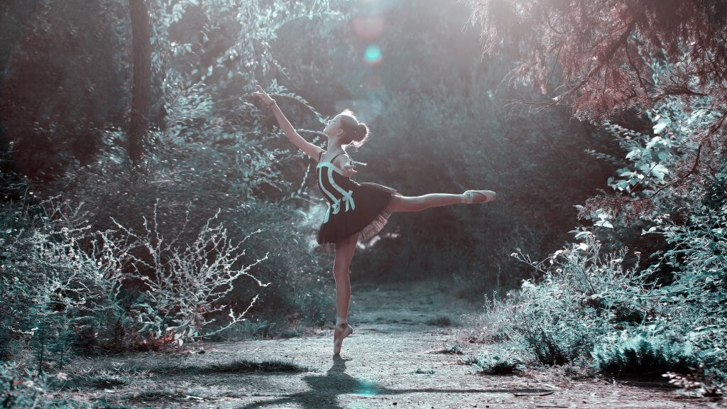a ballerina in the forest